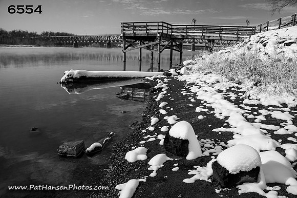 6554 snowy rocks & dock in Riverside Park